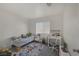 Cozy bedroom design with a colorful rug, bed and study desk at 4833 Integrity St, North Las Vegas, NV 89031