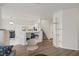 Bright open-concept living area with modern flooring, neutral tones, and seamless flow to the kitchen at 4833 Integrity St, North Las Vegas, NV 89031