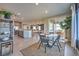 Bright dining area seamlessly connects to the kitchen and living spaces, perfect for entertaining at 510 Copper Falcon Ave, Henderson, NV 89011