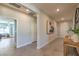 Stylish entryway showcasing neutral tile flooring, artwork, and providing a view of the living space at 510 Copper Falcon Ave, Henderson, NV 89011