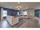 Spacious living room with a bold accent wall, modern furnishings, and plenty of natural light at 510 Copper Falcon Ave, Henderson, NV 89011