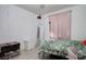 Cozy bedroom featuring neutral walls, wood floors, and natural light at 5541 Ramirez St, North Las Vegas, NV 89031