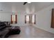 Bright living room with tile floors and natural light coming in from multiple windows at 5541 Ramirez St, North Las Vegas, NV 89031