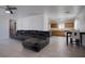 View of living room to kitchen and dining area with tile flooring and open floor plan at 5541 Ramirez St, North Las Vegas, NV 89031