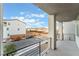 Outdoor balcony area showing the neighborhood with houses and parked cars at 5745 Becklow Gardens Ave, Las Vegas, NV 89141