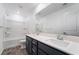 Bathroom with double sink vanity, large mirror, and shower-tub combo at 5745 Becklow Gardens Ave, Las Vegas, NV 89141