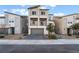 Charming two-story home with gray stucco and a paved driveway at 5745 Becklow Gardens Ave, Las Vegas, NV 89141