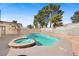 Backyard featuring a swimming pool, patio area, and desert landscaping at 6130 Desert Sun Dr, Las Vegas, NV 89110