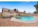 Enjoy the private pool with an attached spa and patio on a sunny day at 6130 Desert Sun Dr, Las Vegas, NV 89110