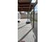 The backyard offers a partially covered patio, landscaping, and a basketball hoop at 6717 Sheffield Dr, Las Vegas, NV 89108