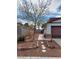 Landscaped front yard with walkway and rock features adding character to the home's curb appeal at 6717 Sheffield Dr, Las Vegas, NV 89108