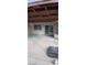 Back patio featuring a covered pergola, basketball hoop, and sliding glass door at 6717 Sheffield Dr, Las Vegas, NV 89108