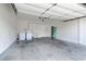 Spacious garage with washer, dryer, and utility sink at 6938 Silk Oak Ct, Las Vegas, NV 89148