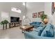 Bright living room with high ceilings, modern furniture, and plenty of natural light at 6938 Silk Oak Ct, Las Vegas, NV 89148