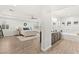 Large main bedroom featuring a sitting area and an ensuite bathroom with a soaking tub at 7165 N Grand Canyon Dr, Las Vegas, NV 89149