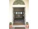 Welcoming entryway with an open door, decorative rug, and views of the home's interior at 7444 Grassy Field Ct, Las Vegas, NV 89131