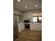 Modern kitchen showcasing white cabinetry, stainless steel appliances, and ample counter space at 7444 Grassy Field Ct, Las Vegas, NV 89131