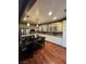 Kitchen with breakfast bar, modern appliances, and dining table at 8558 Rumsfield Ct, Las Vegas, NV 89131