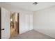 Bedroom featuring carpet, neutral walls, and closet doors for plenty of storage space at 8805 Pavia Dr, Las Vegas, NV 89117