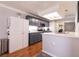 Well-lit kitchen featuring gray cabinets, stainless steel appliances, and a spacious countertop at 8872 Hampton Green Ave, Las Vegas, NV 89129