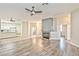 Spacious living room with hardwood floors and a modern fireplace at 9002 Purple Leaf St, Las Vegas, NV 89123