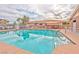 Community pool with comfortable seating and a relaxing atmosphere at 9002 Purple Leaf St, Las Vegas, NV 89123