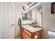 Bathroom featuring a granite countertop and mirror at 9071 Ravenhurst St, Las Vegas, NV 89123