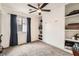 Bedroom featuring carpeted floors, closet storage, and a ceiling fan at 9071 Ravenhurst St, Las Vegas, NV 89123