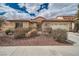 Lovely single-story home with a tidy front yard, complemented by a convenient two-car garage at 9071 Ravenhurst St, Las Vegas, NV 89123