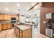 Modern kitchen featuring stainless steel appliances and a breakfast bar at 9071 Ravenhurst St, Las Vegas, NV 89123