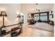 Spacious living room featuring tile flooring and a ceiling fan at 9071 Ravenhurst St, Las Vegas, NV 89123