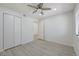 Well-lit bedroom with wood-style floors and a double door closet at 950 Seven Hills Dr # 722, Henderson, NV 89052