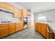 Kitchen with stainless steel appliances and marble countertops at 9725 La Cienega St, Las Vegas, NV 89183