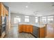 Kitchen showcases stainless steel dishwasher and sink with marble countertops at 9725 La Cienega St, Las Vegas, NV 89183