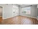 Bright living room with stylish flooring and natural light, enhanced by access to an outdoor space at 9725 La Cienega St, Las Vegas, NV 89183