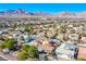 A scenic aerial view of the neighborhood with desert mountain backdrop at 11773 Golden Moments Ave, Las Vegas, NV 89138