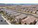 An aerial image showcases neighborhood design and surrounding desert views at 10052 Silver Comet Ct, Las Vegas, NV 89178
