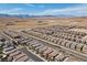 Stunning aerial view of a desert community with mountain views in the distance at 10052 Silver Comet Ct, Las Vegas, NV 89178