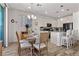 Open-concept kitchen with an adjacent dining area for seamless entertaining and Gathering gatherings at 10052 Silver Comet Ct, Las Vegas, NV 89178