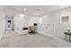 Bright and airy loft area featuring a functional workspace and neutral decor, perfect for a home office at 10052 Silver Comet Ct, Las Vegas, NV 89178