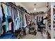 Spacious walk-in closet with ample storage and organization options, catering to wardrobe needs at 10052 Silver Comet Ct, Las Vegas, NV 89178