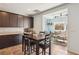 Bright dining area offering a seamless transition to the adjacent living space at 1033 Via Dell Bacio Dr, Henderson, NV 89052