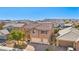 Charming two-story home with a tile roof and a spacious two-car garage at 1033 Via Dell Bacio Dr, Henderson, NV 89052