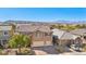 Charming two-story home with a tile roof and a spacious two-car garage at 1033 Via Dell Bacio Dr, Henderson, NV 89052