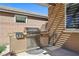 Built-in stainless steel grill with counter space, perfect for outdoor cooking and entertaining at 1033 Via Dell Bacio Dr, Henderson, NV 89052