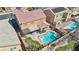 Aerial view of the backyard showcasing a pool, hot tub, and outdoor seating area at 1033 Via Dell Bacio Dr, Henderson, NV 89052