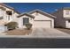 Charming single story home with desert landscaping, a two-car garage, and a clean, welcoming facade at 1056 Sweeping Ivy Ct, Las Vegas, NV 89183