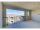 View from the balcony showcasing nearby houses and distant mountain views at 1103 Tektite Ave, Henderson, NV 89011