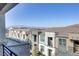 Scenic view from balcony of nearby residential houses, blue skies, and distant mountains at 1103 Tektite Ave, Henderson, NV 89011