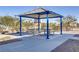 Shaded community picnic area with seating, landscaping, and a walking trail at 1103 Tektite Ave, Henderson, NV 89011